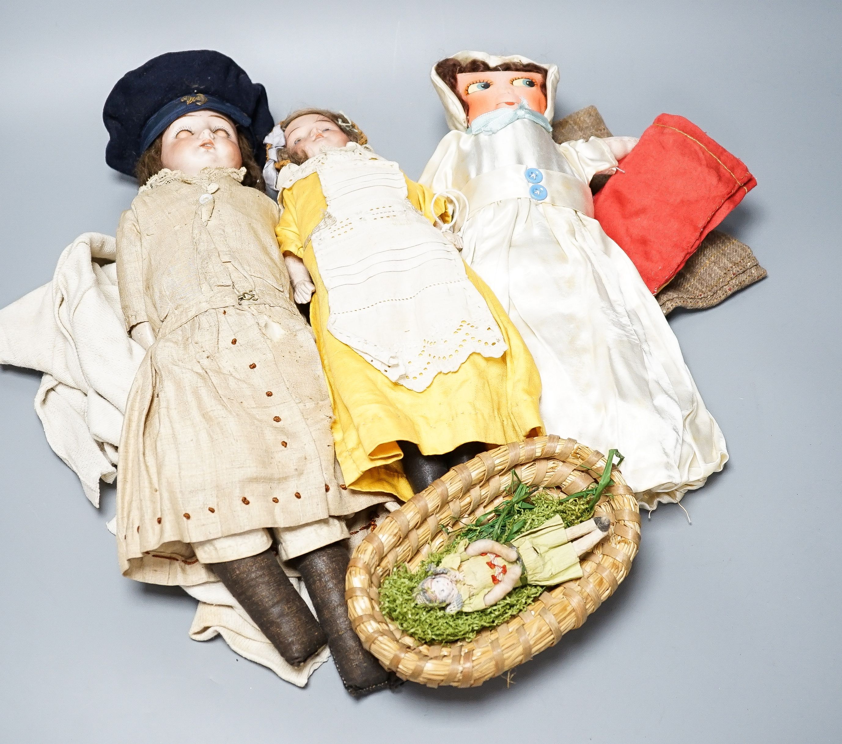 Two German bisque headed dolls, marked ‘Mabel 14/0’, 32cm and the other ‘Darling 6/0’, 42cm and two fabric dolls (4)